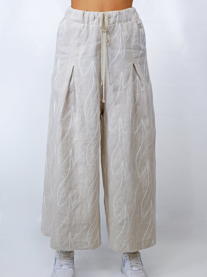 pantaloni in tessuto di lino con ricami a rilievo